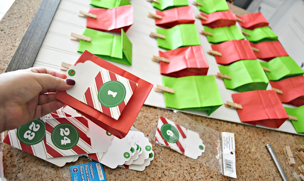 Easy DIY Wooden Advent Calendar with Hanging Treat Bags | Hip2Save