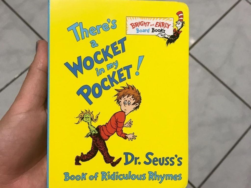 hand holding There's a wocker in my pocket dr suess book