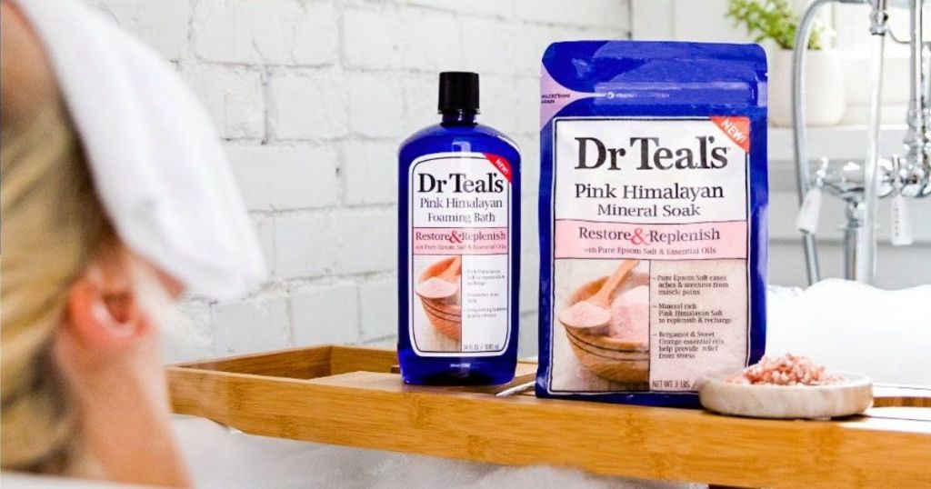 dr teals foaming bath and mineral sock on tray over bath