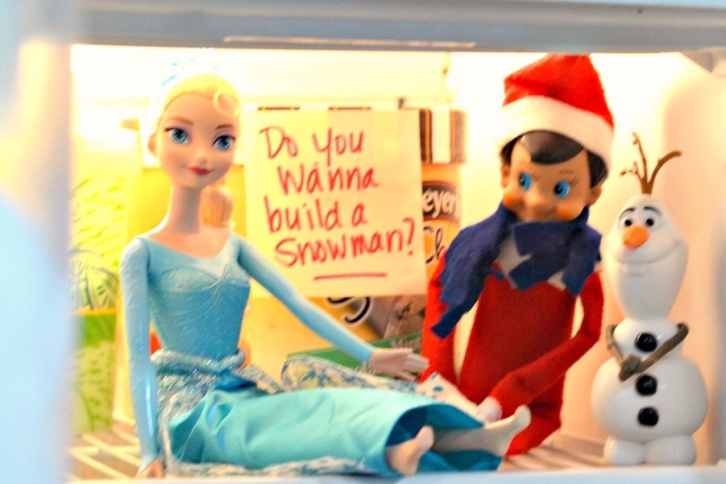 elf on the shelf doll in freezer with elsa and olaf frozen