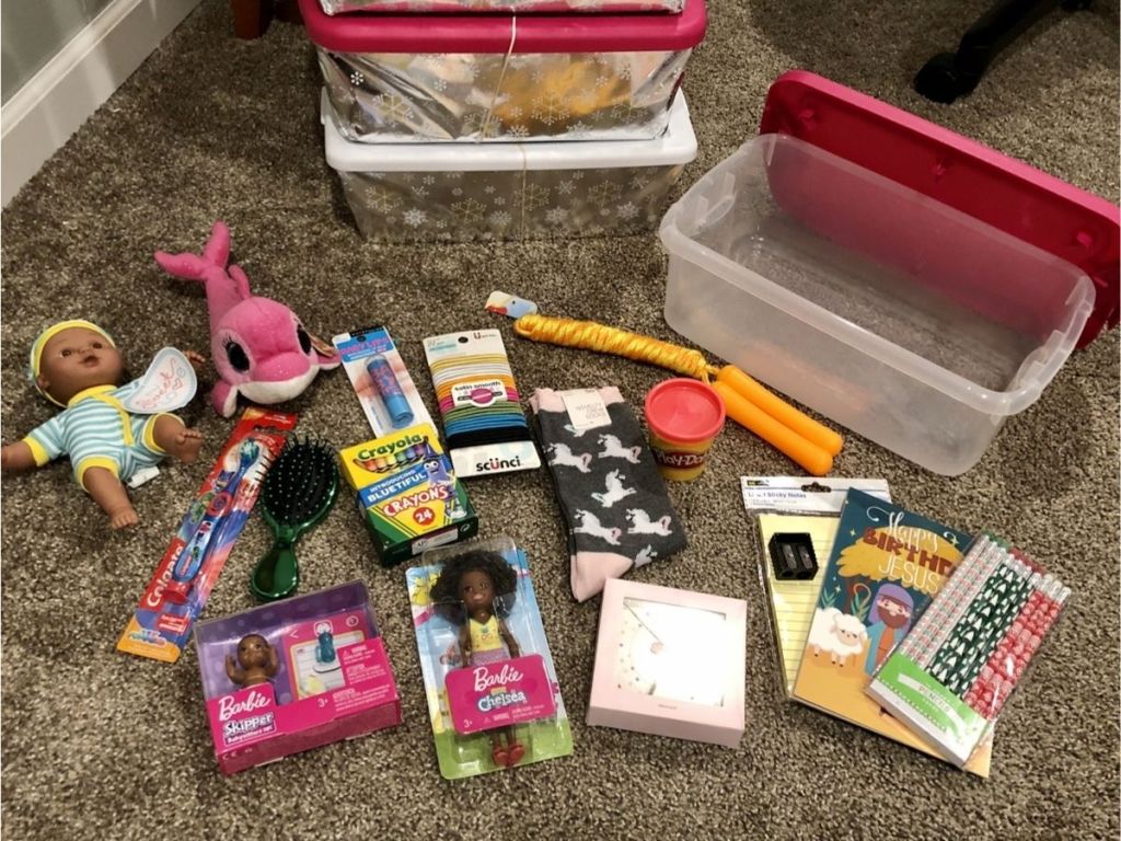 toys and children's necessities spread out on the floor