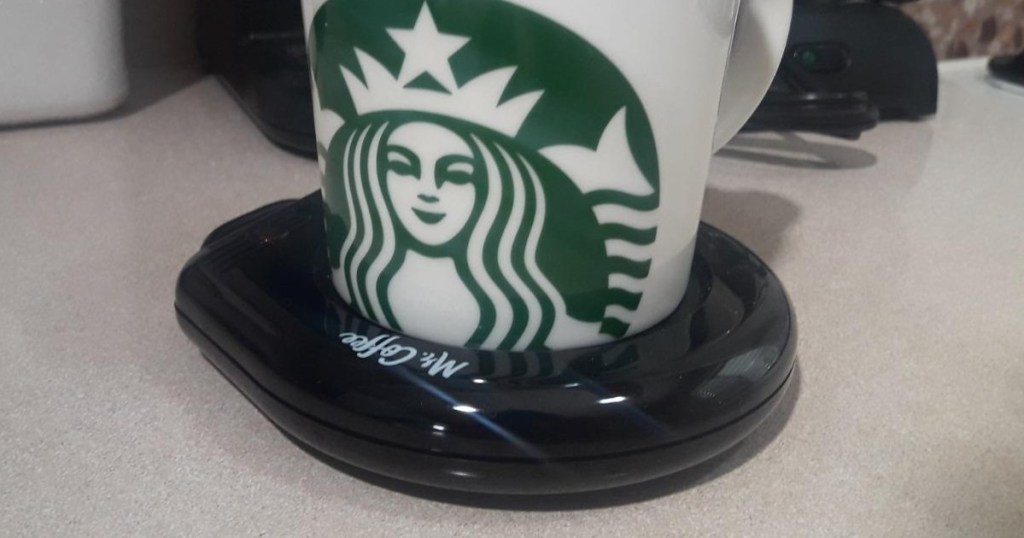 Starbucks mug on coffee warmer