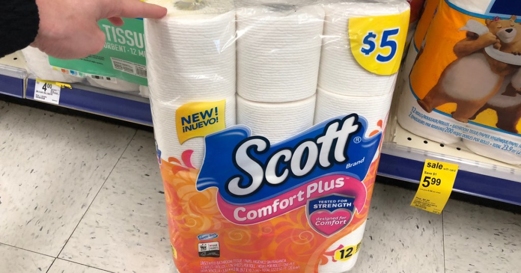 package of toilet paper by store shelf