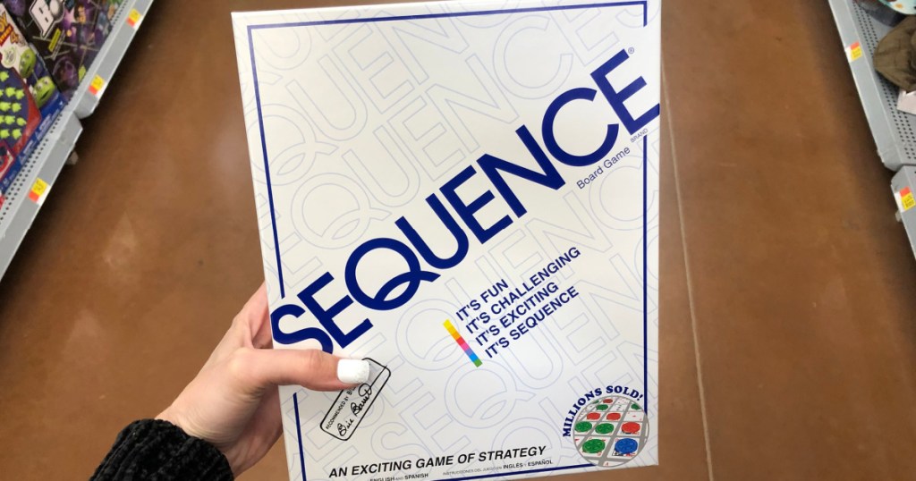 sequence board game in hand in store