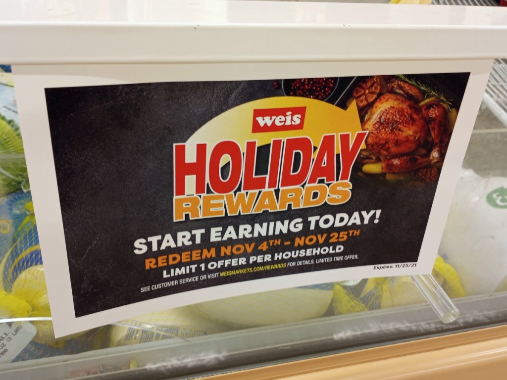 rewards signage in grocery store
