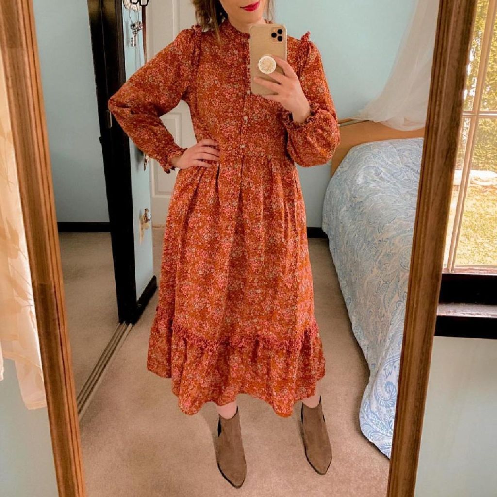 woman taking selfie in prairie dress