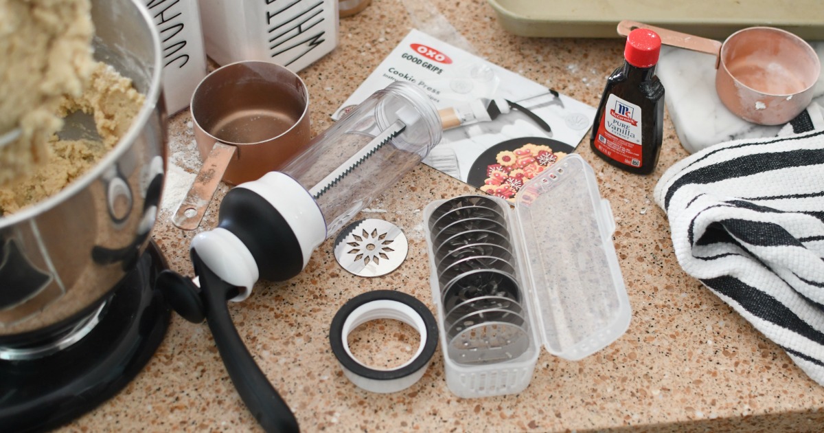 https://hip2save.com/wp-content/uploads/2020/12/14-piece-OXO-cookie-press-on-the-counter-.jpg?resize=1200%2C630&strip=all
