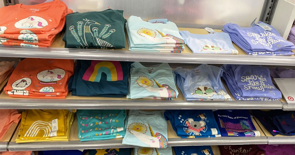 store display shelves full of girls cat & jack graphic tshirts