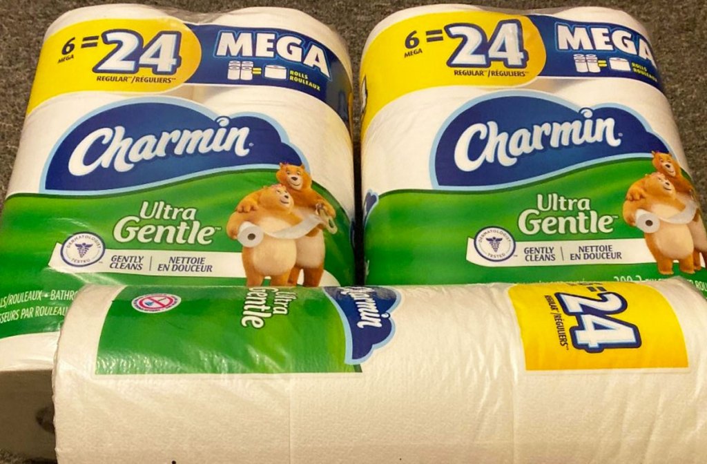 three packages of charmin ultra gentle toilet paper