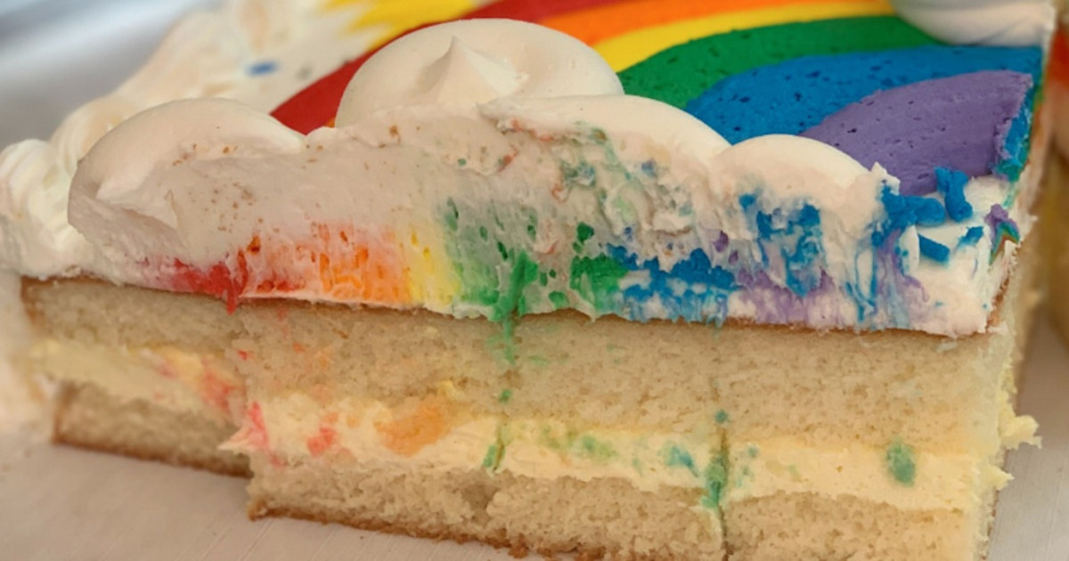 Costco sheet rainbow sheet cake half eaten