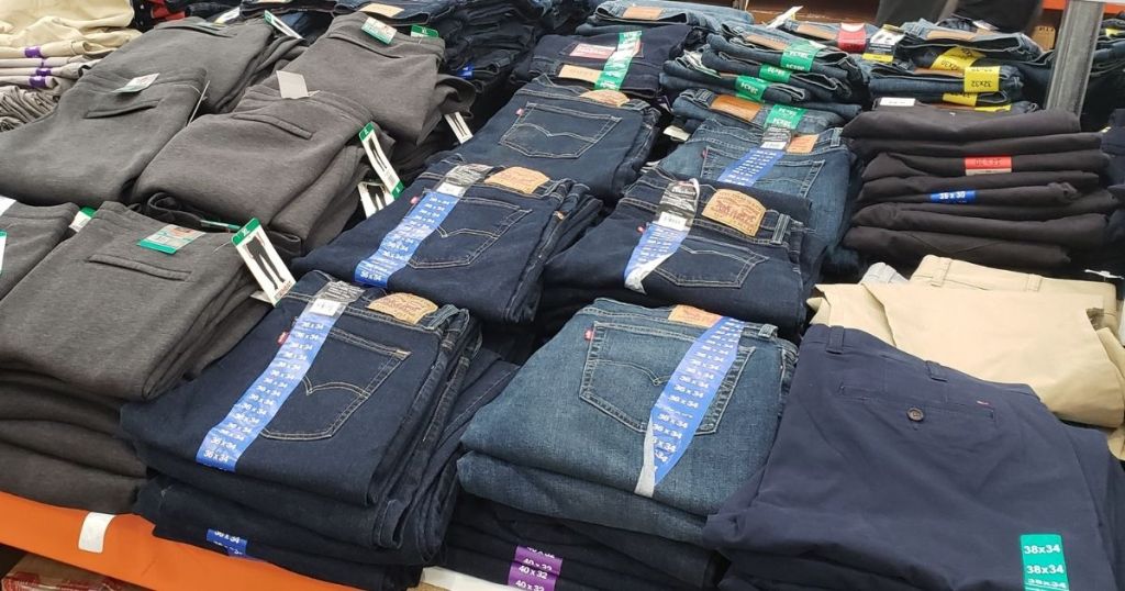 table with men's pants on it at Costco