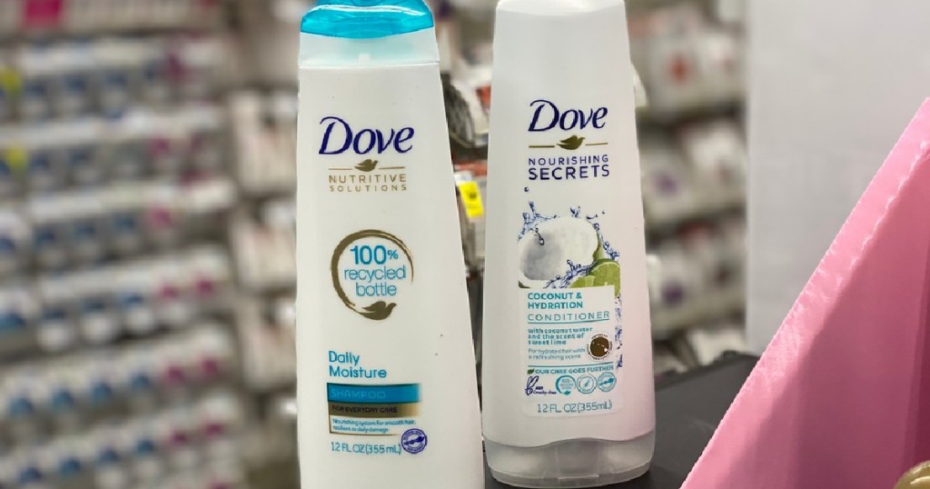 two bottles of shampoo and conditioner in store