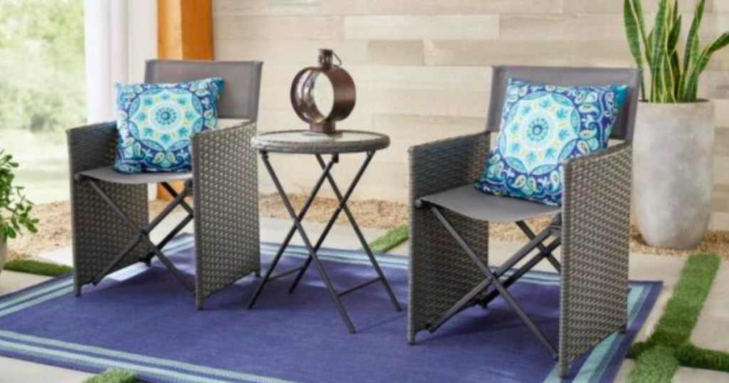 patio furniture set outside on a rug