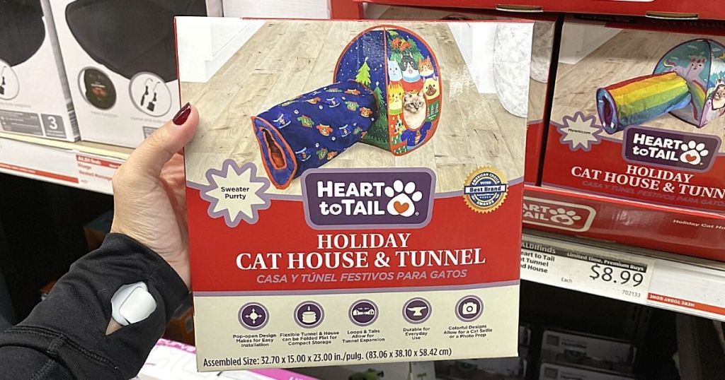 hand holding heart to tail cat house and tunnel
