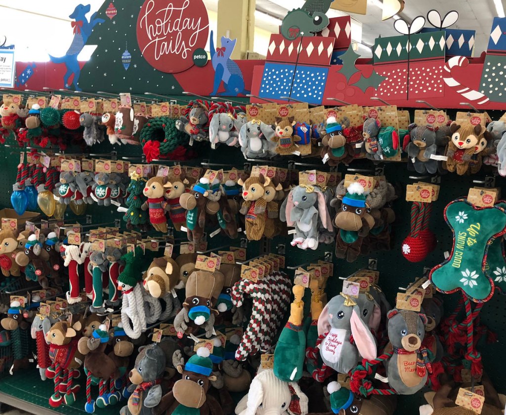 display of christmas themed dog toys at petco