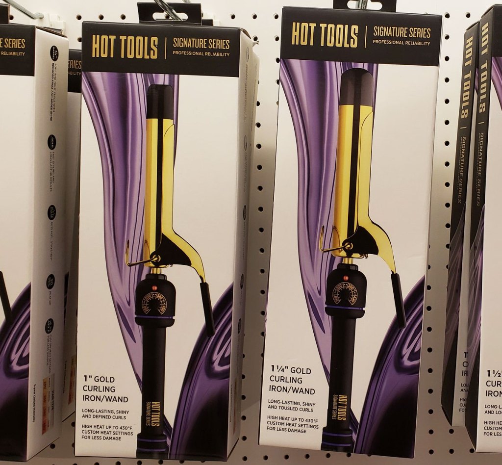 hot tools curling irons on store display wall