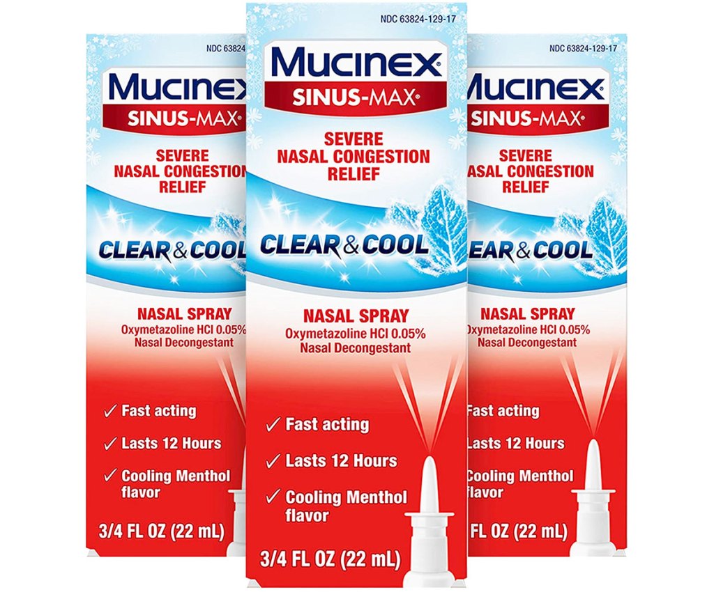 three blue and red boxes of mucinex nasal spray