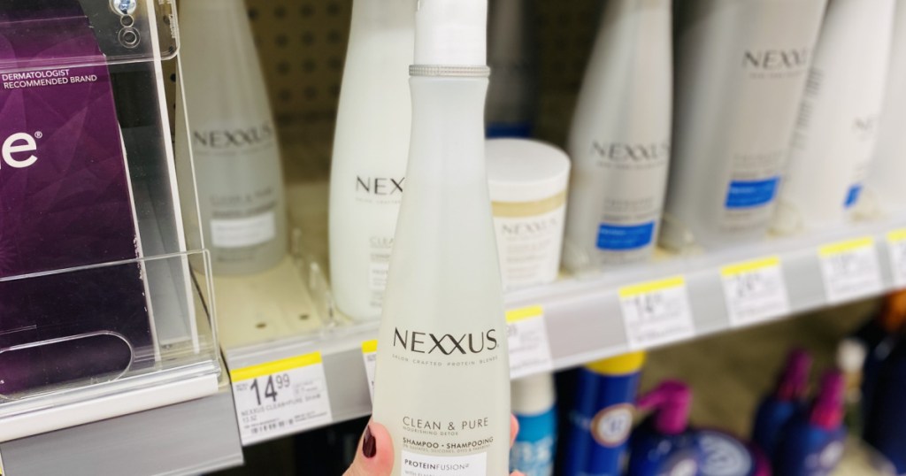 hand holding nexxus shampoo