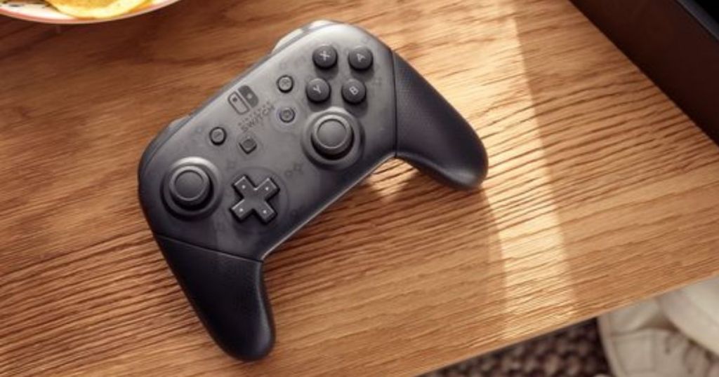 Nintendo Switch Pro Controller on wood table