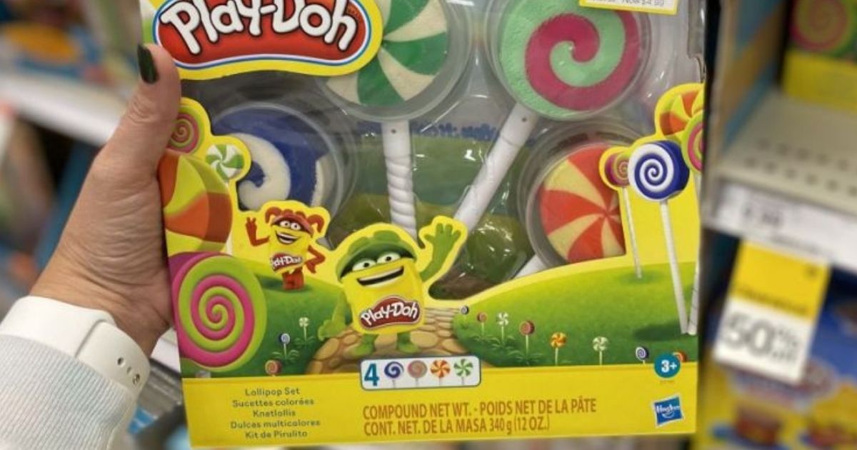hand holding a Play Doh Lollipops package in store