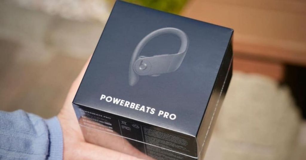 hand holding box of Powerbeats Pro Wireless Earphones