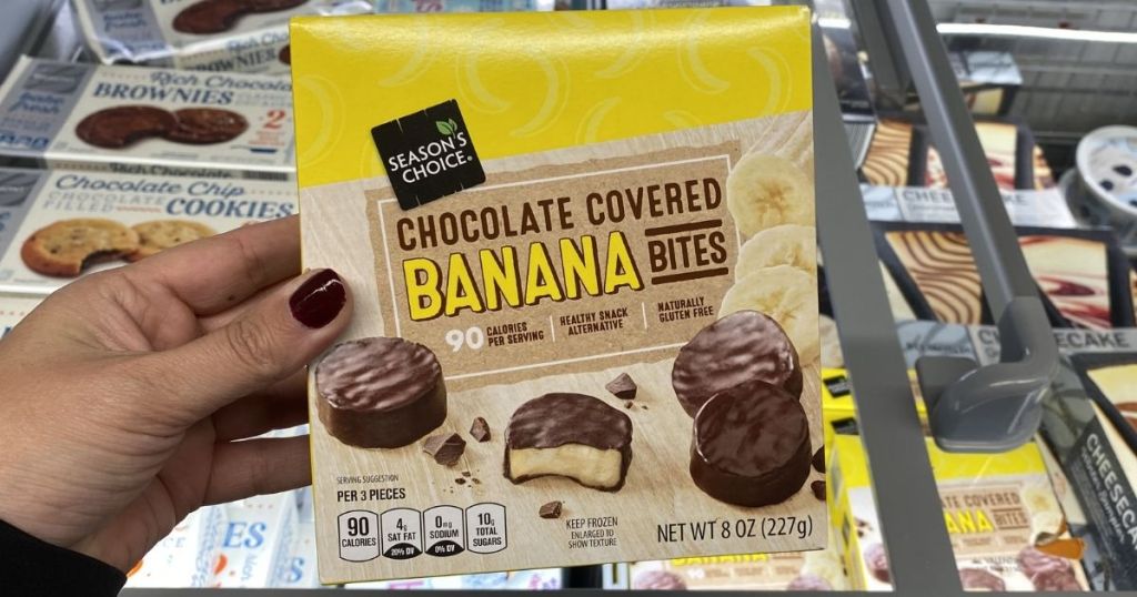 hand holding a box of Season's Choice Chocolate Covered Banana Bites