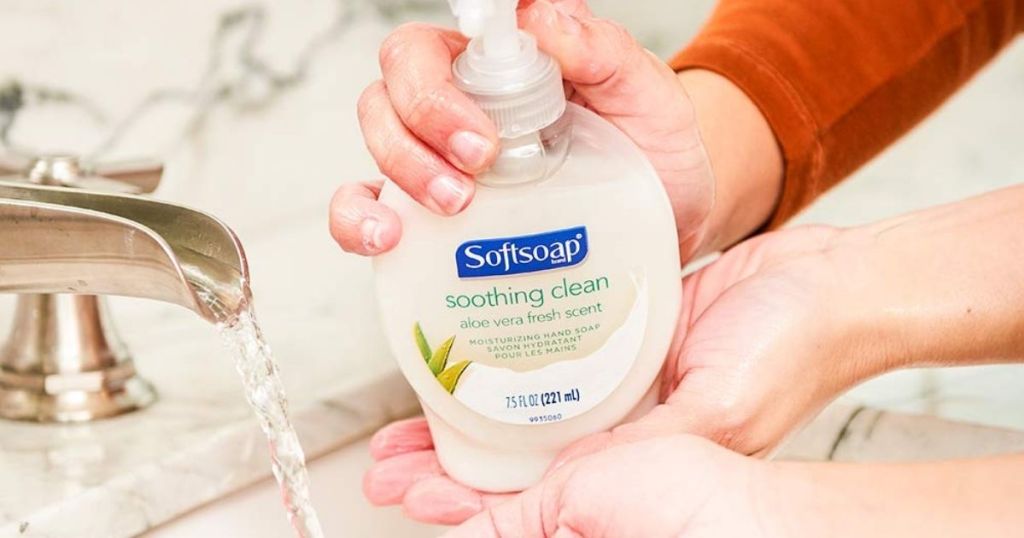 hands washing in sink with Softsoap Soothing Clean Aloe Vera