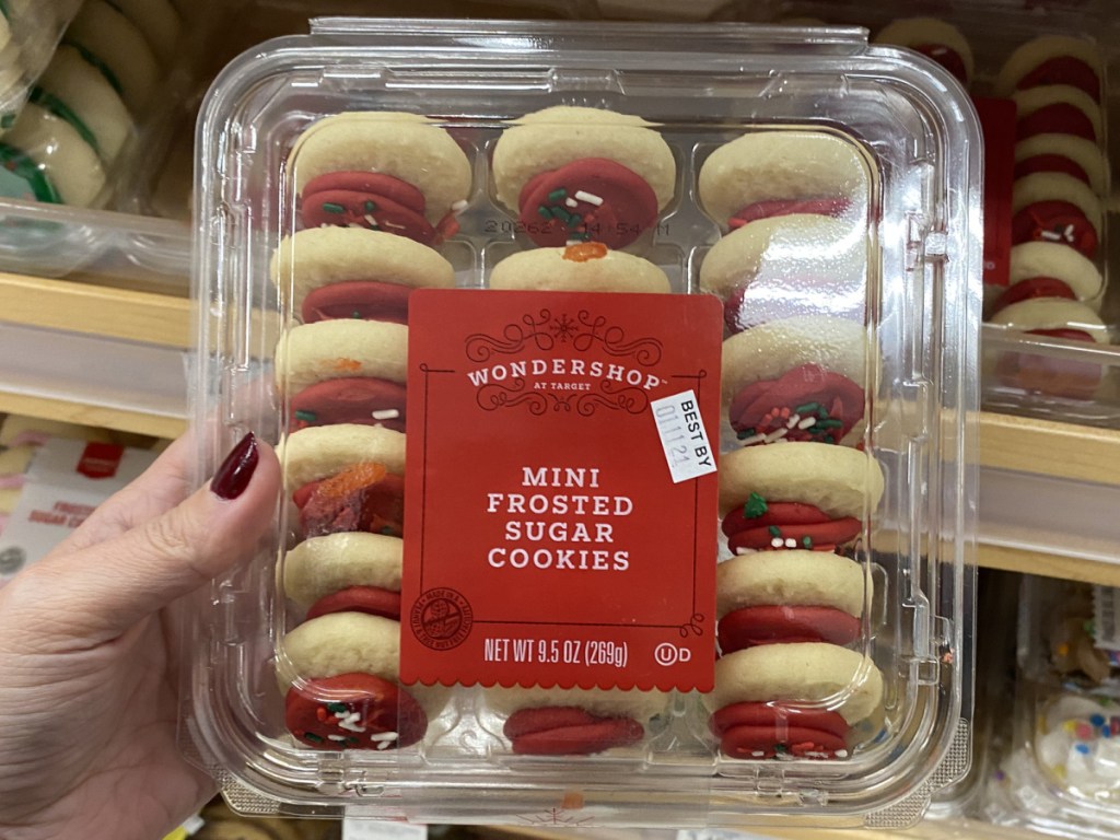 hand holding mini frosted sugar cookie at target 