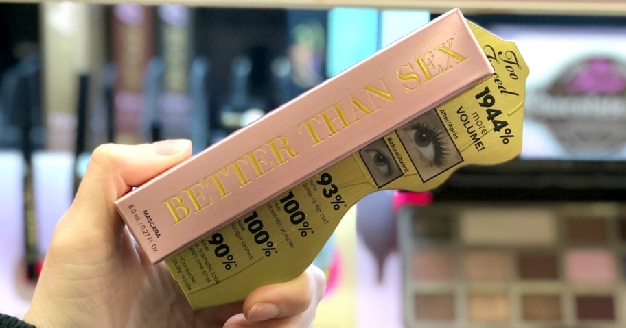 hand holding Too Faced mascara in a package