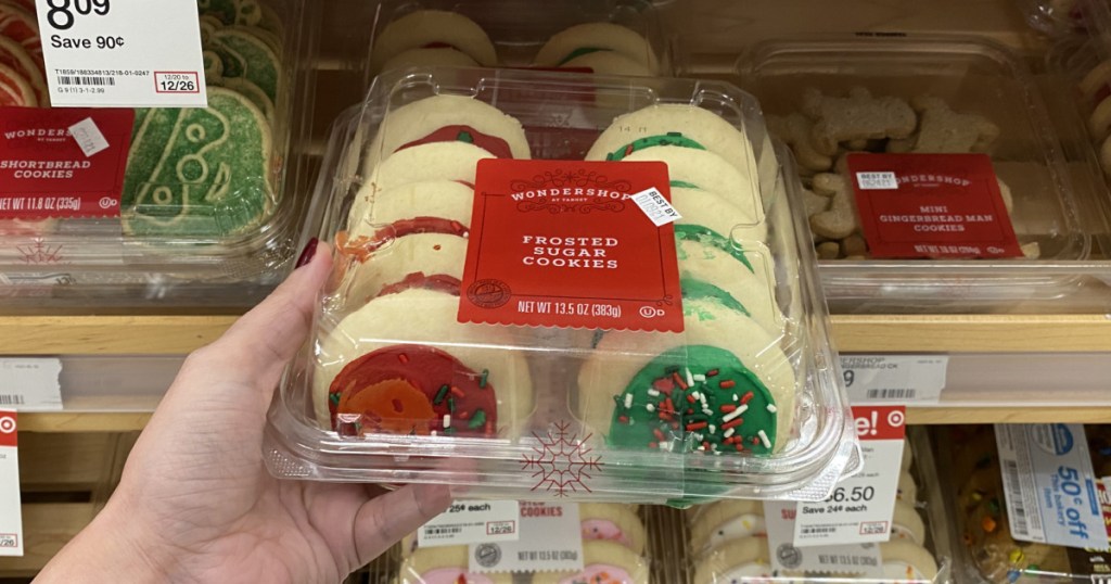 hand holding wondershop fraoted sugar cookies at target 