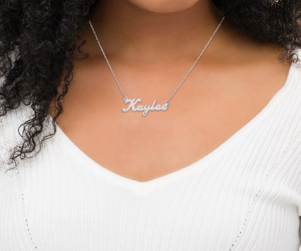 woman wearing name necklace