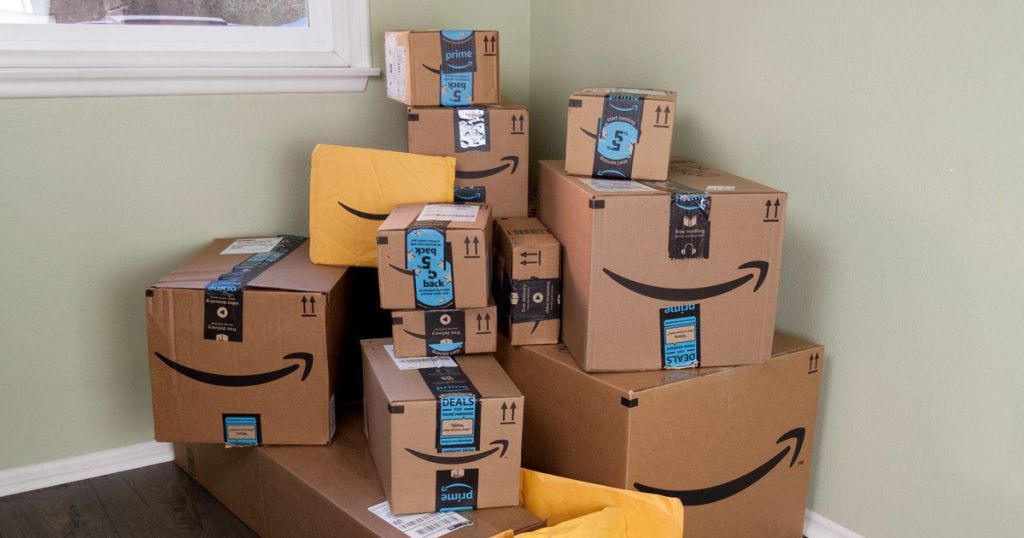 Amazon boxes piled in corner