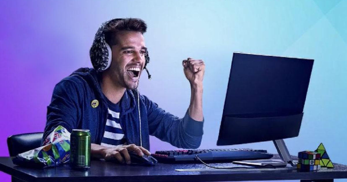 man playing game on PC