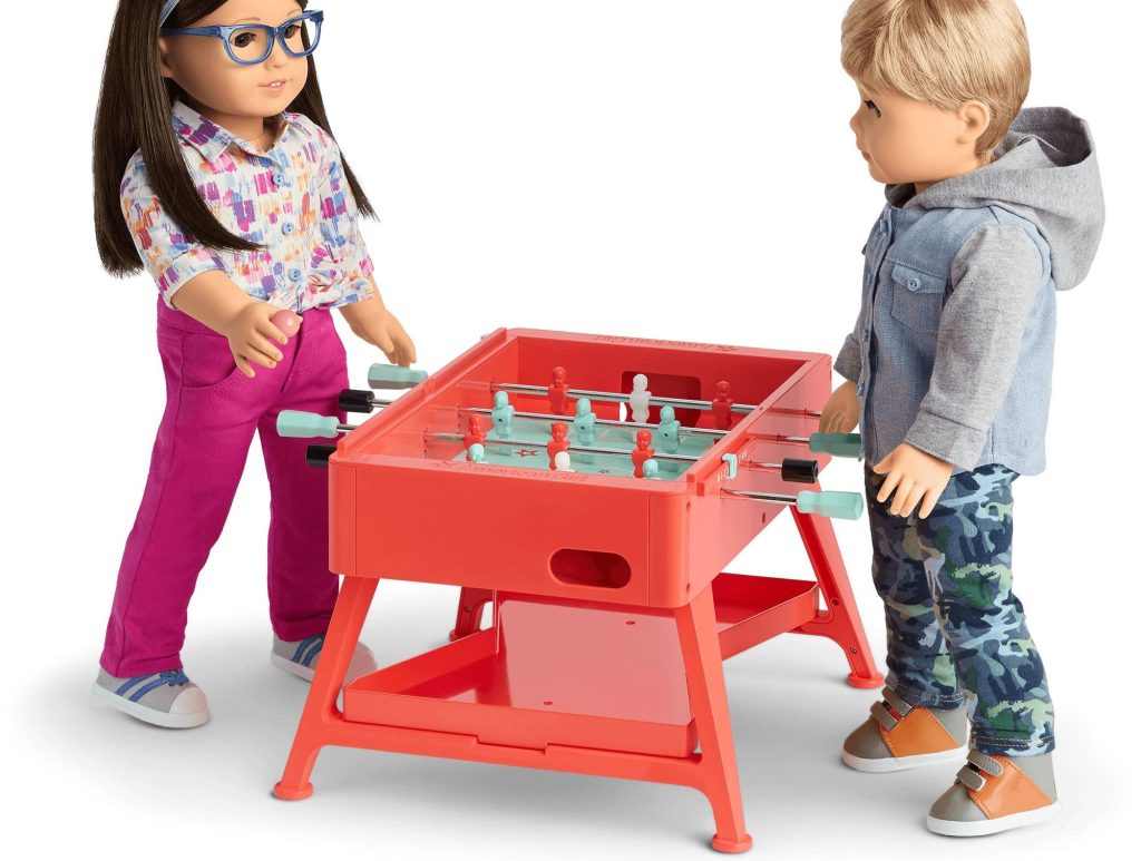 american girl game table with dolls playing