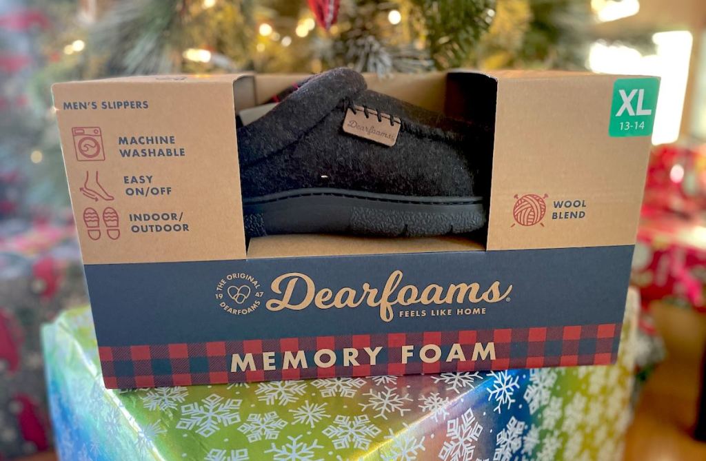 dearfoams slippers in box in front of lit christmas tree