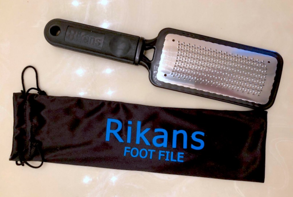 black foot file with bag laying on countertop dry feet remedies