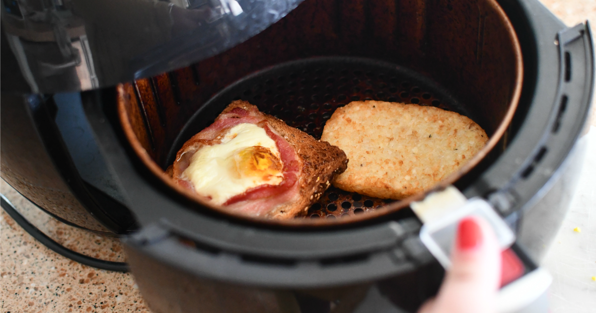 https://hip2save.com/wp-content/uploads/2020/12/frozen-hashbrown-patty-and-egg-with-bacon-toast-in-the-air-fryer-.png