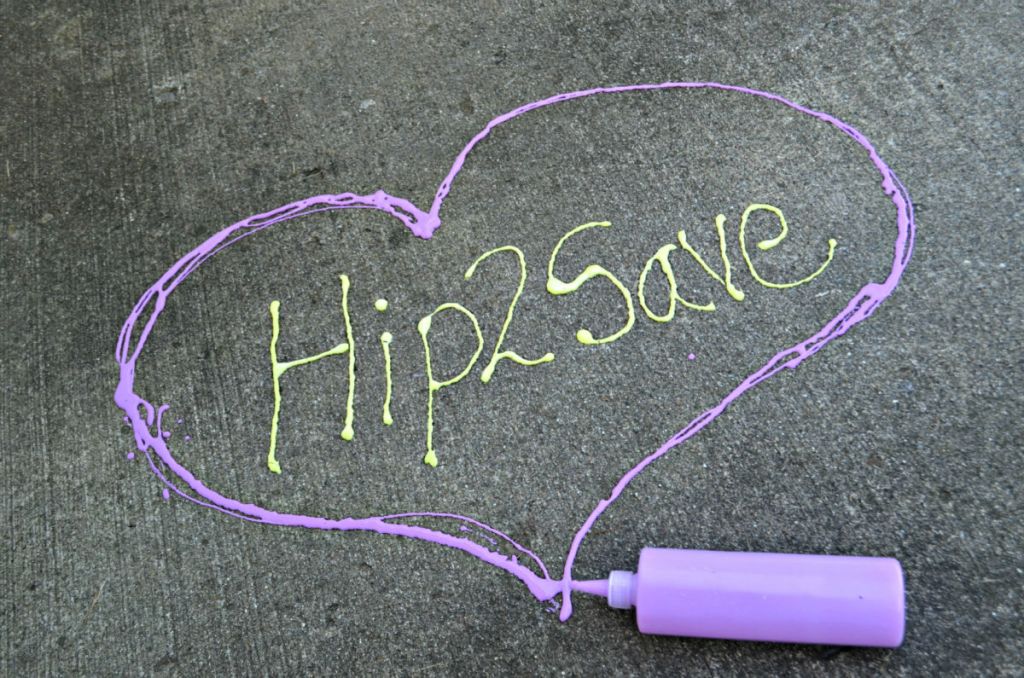 Hip2Save written on sidewalk inside heart