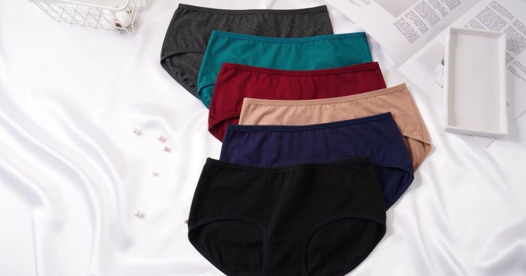 group of underwear on a bed