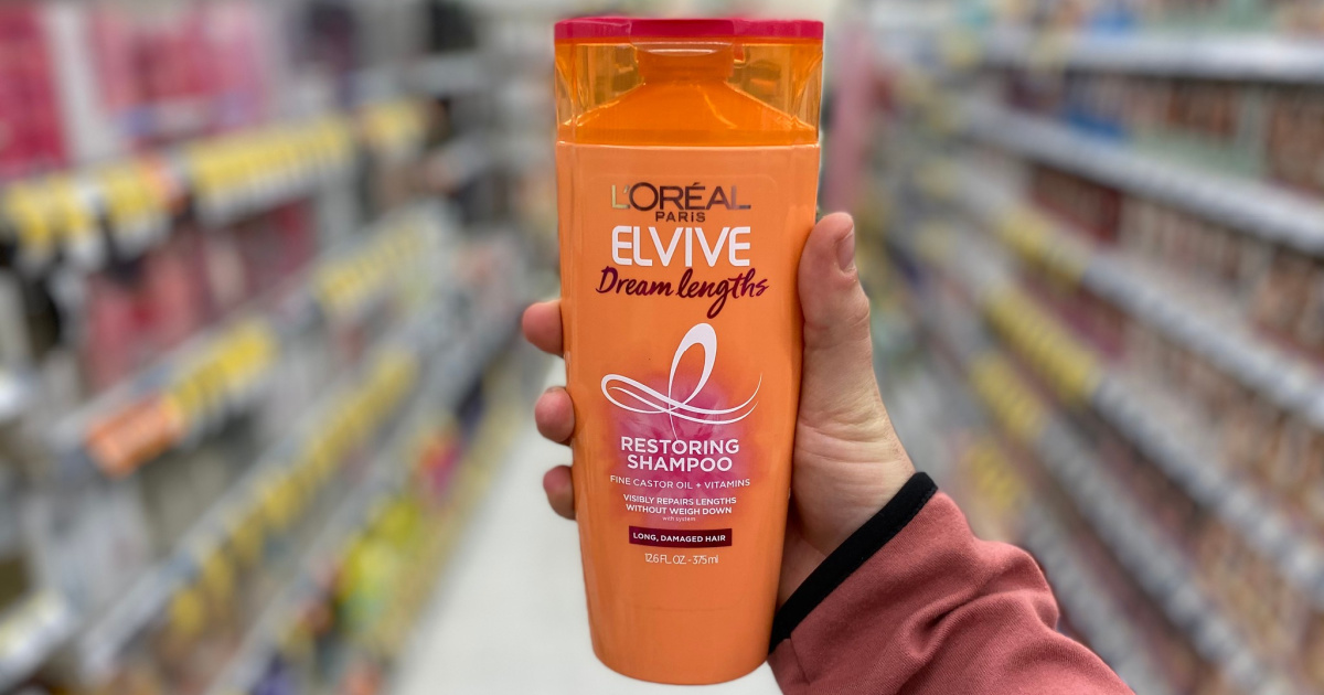 l'oreal elvive shampoo in hand in store at walgreens