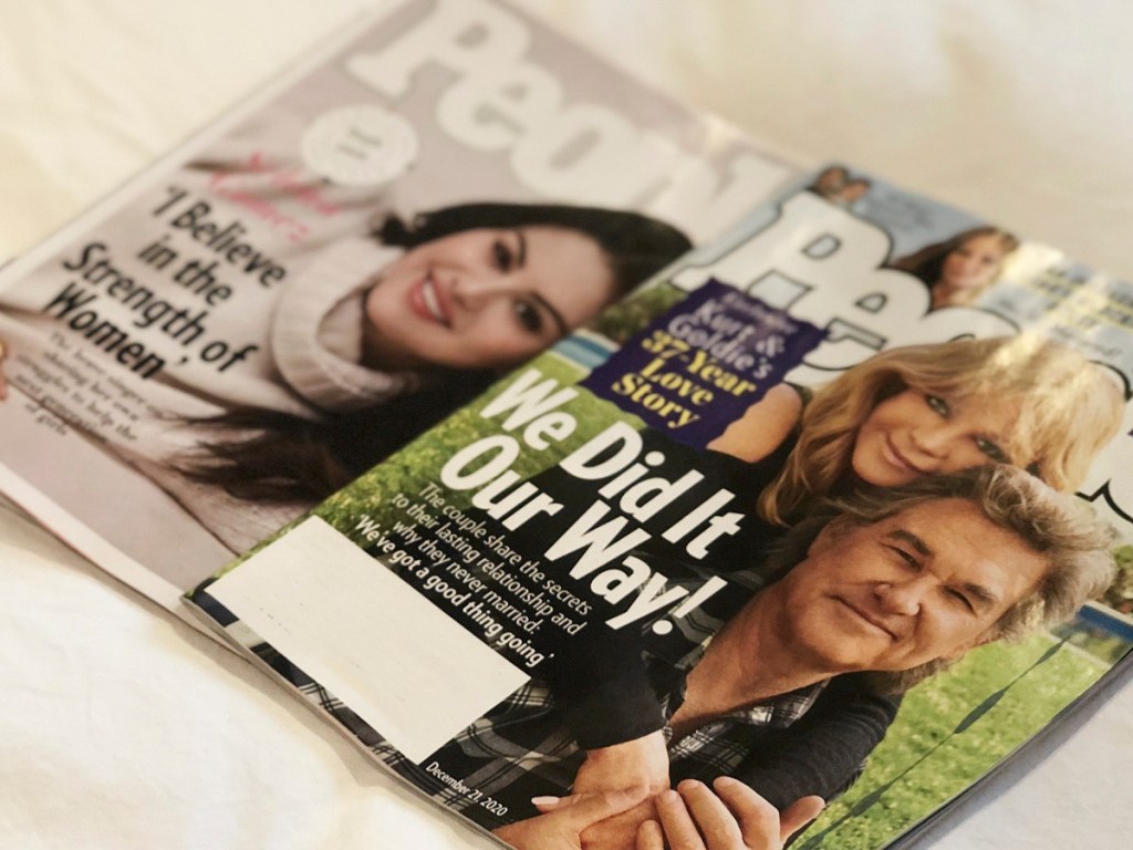 People Magazine issues on bed
