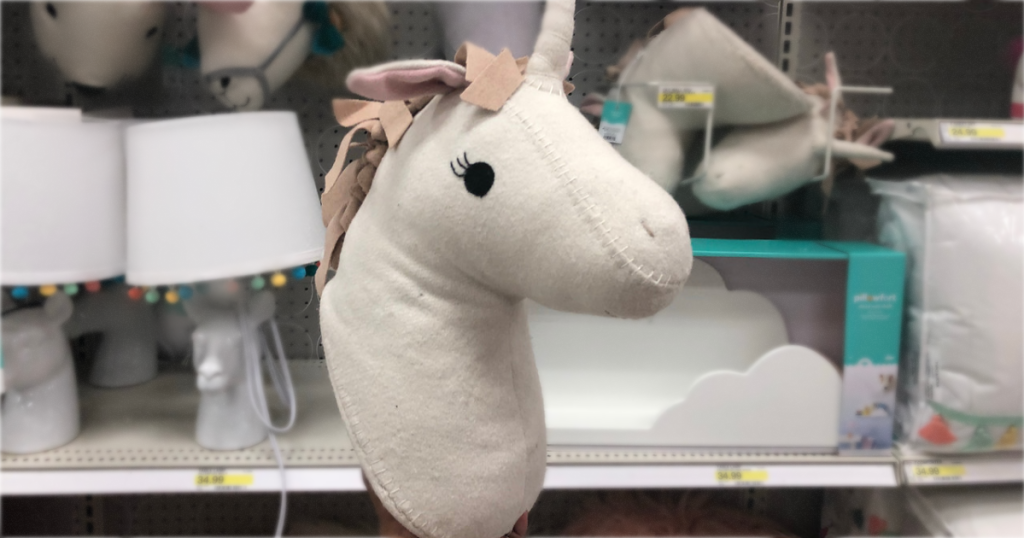 plush unicorn head in store display
