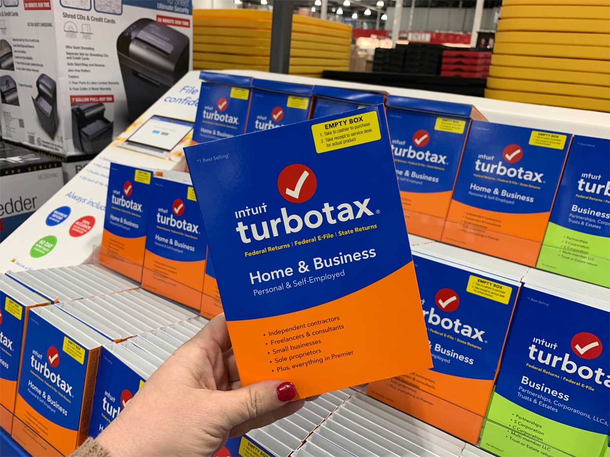 hand holding a turbotax software program in store