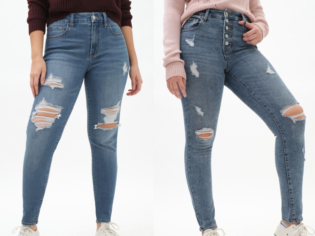 two women in high rise skinny jeans with rips and knees