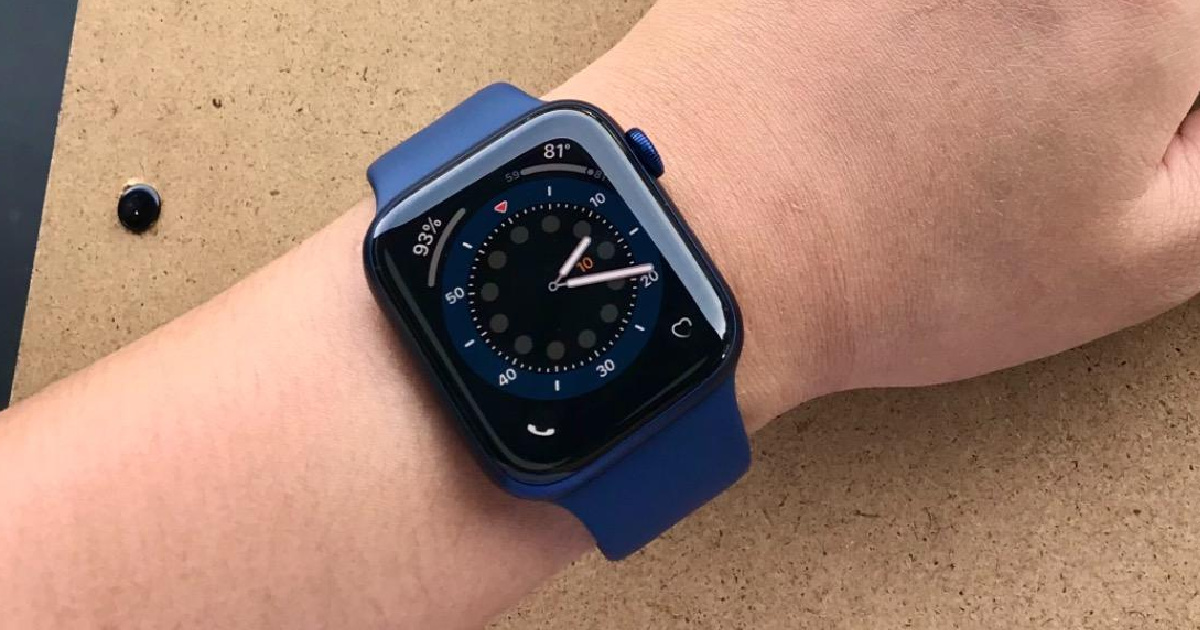 person wearing a navy blue apple watch 6