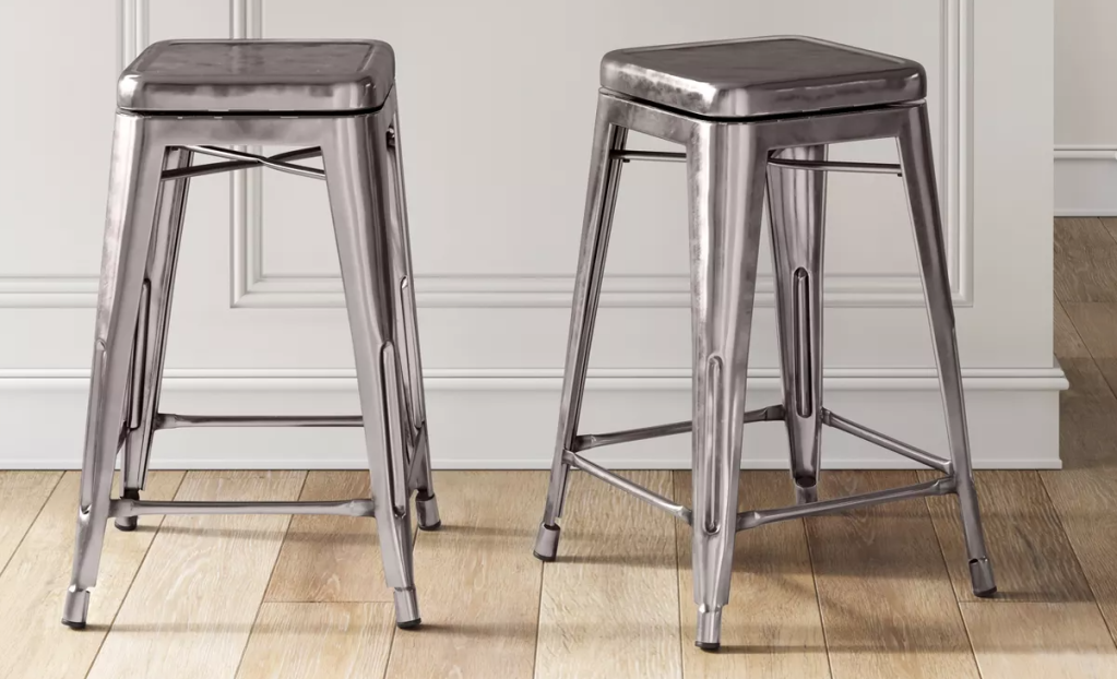 two stools next to a counter