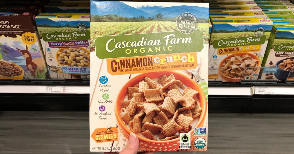 lady holding cascadian farm cereal