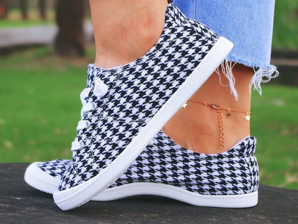 lady wearing checkered shoes from Amazon