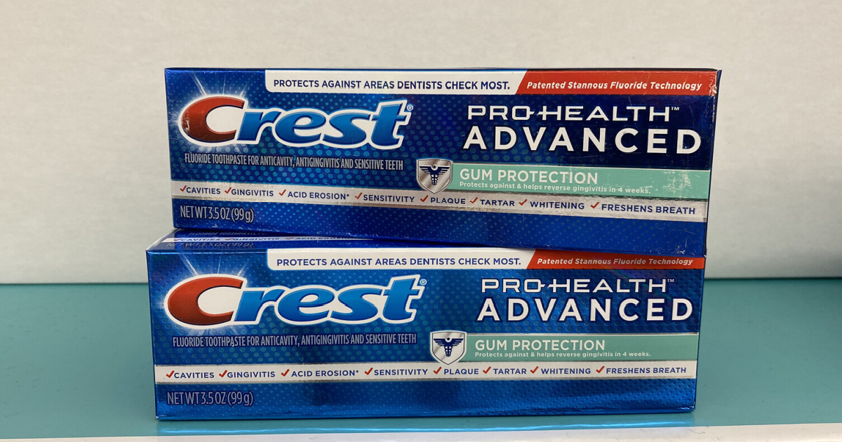 two boxes of Crest toothpaste stacked on top of each other