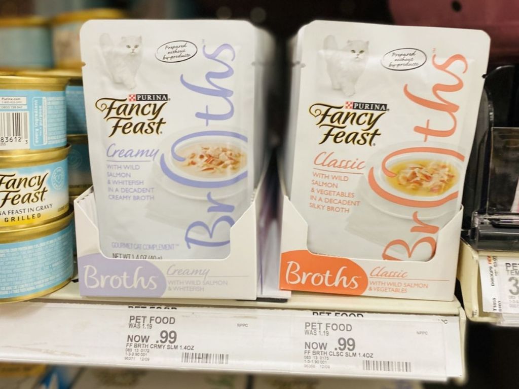 Store shelf with pouches of Fancy Feast Broths